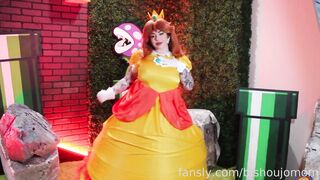 BishoujoMom as Princess Peach shows us her giant tits and sucks on dildo