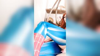 Sexy brunette MollyRedWolf as Spider-Man uses her finger to stretch her pussy lips and masturbate