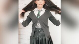 Babybubblegum dressed in her school girl outfit slowly undresses for you while dancing